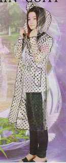 jas hujan model mantel atau gamis dengan bahan dasar warna bening transparan motif polkadot