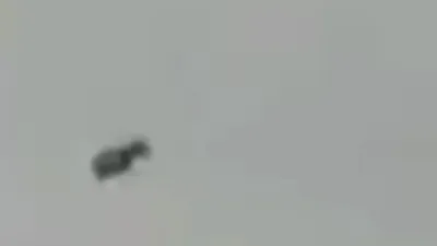 Colombia UFO shows black crsft with light's underneath it.