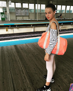 girl at railway platform