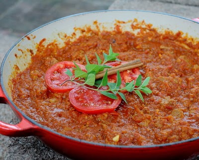 Lamb with Sweet Tomato Jam, a Moroccan-style lamb stew, cooked in a 'jam' of onions and fresh tomatoes, seasoned with cinnamon, saffron and honey.