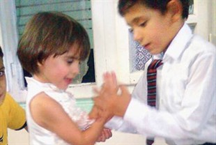 Khaled and Hala, ages 5 and 3, are engaged