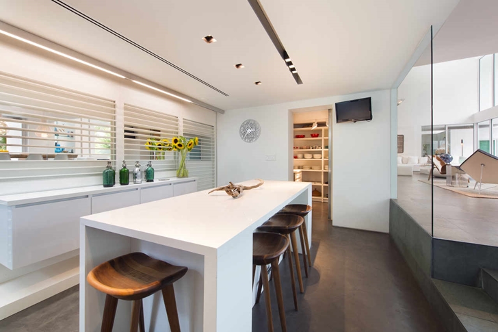 Dining table in the kitchen of Modern mansion in Miami