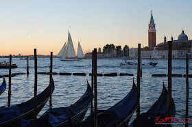 A sailing boat and gondolas on the Grand Canal, Venice Italy - Photograph  by Kent Johnson.
