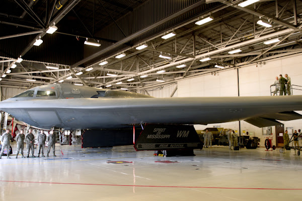 Army General Martin Dempsey, chairman of the Joint Chiefs (the leftmost of the trio atop the wing), checks out a B-2 bomber at Whitman Air Force Base in Missouri, June 18. DoD photo / D. Myles Cullen