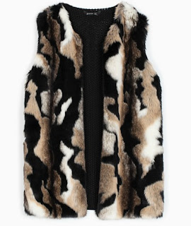 https://ad.zanox.com/ppc/?36462263C78545846&ulp=[[http://www.stradivarius.com/fr/des-soldes/v%C3%AAtements/maille/gilet-fourrure-c1390551p6463516.html?categoryNav=1390551&colorId=001&bundleId=6802511&defaultColorId=001&utm_source=zanox&utm_medium=afiliacion&utm_campaign=S2015]]