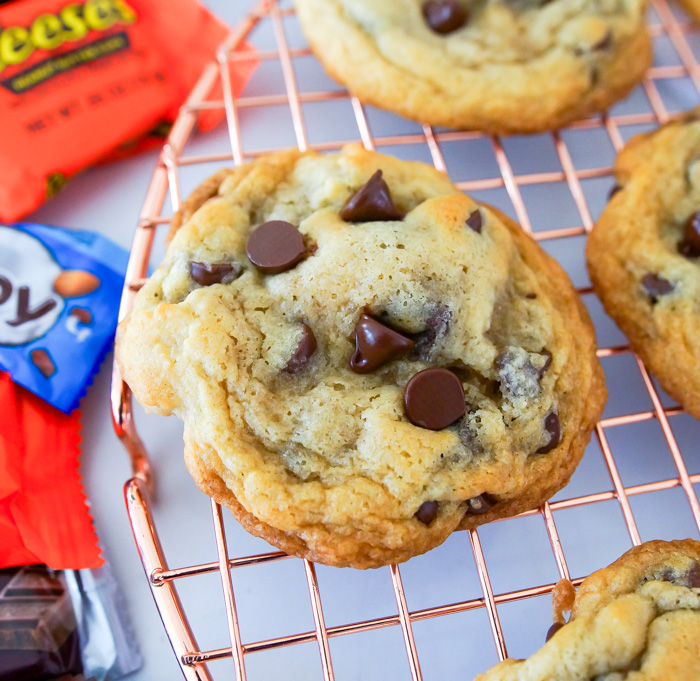 Chocolate Chip Candy Bar-Stuffed Cookies on copper wire rack