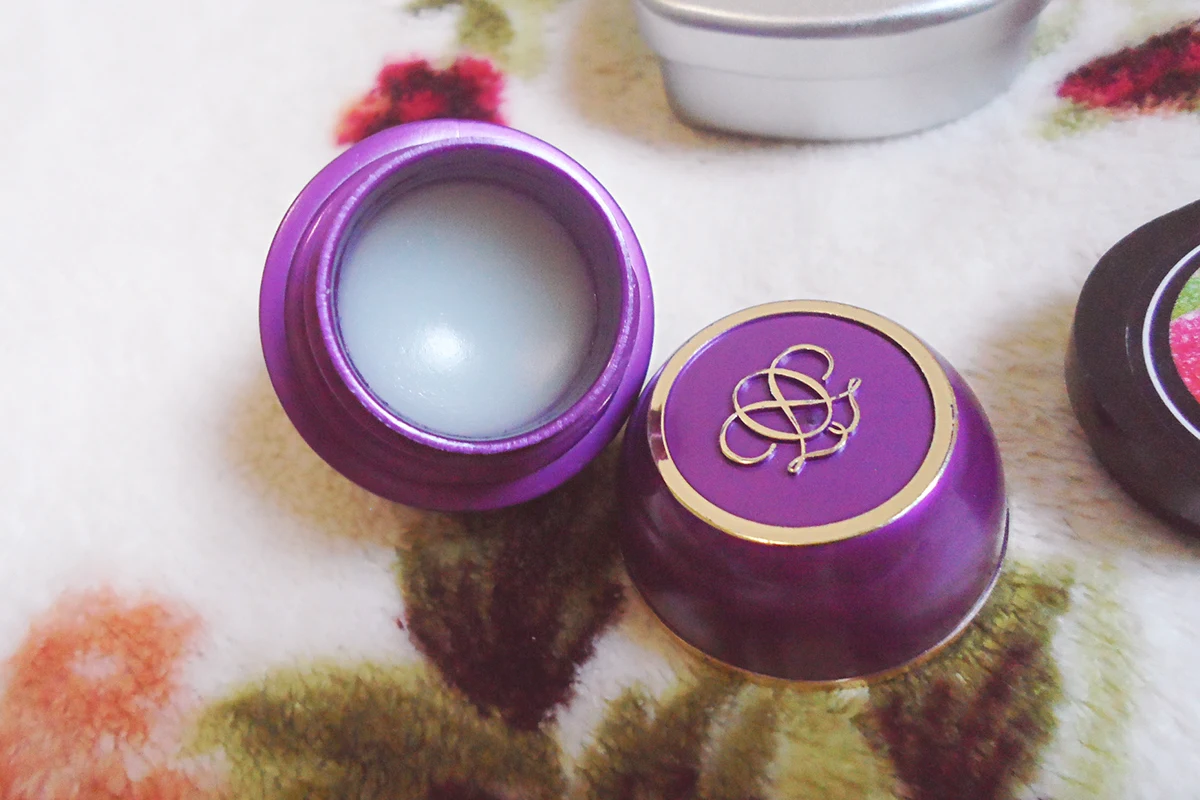 close-up of an opened pot with oriflame tender care balm