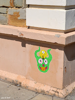 green demon face