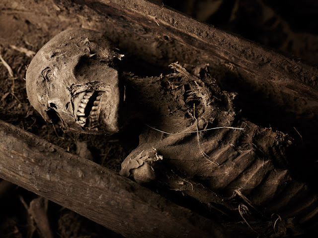 YEMREHANNA KRISTOS  A pilgrim's corpse rests at Yemrehanna Kristos, Lalibela Ethiopia. 