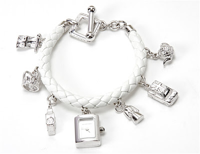 charm bracelet tattoo. On the other end of the spectrum is this lush, charm bracelet tattoo. On the other end of the spectrum is this lush,