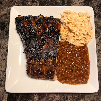 Barbecued spare ribs, Dr. Pepper baked beans and sriracha slaw