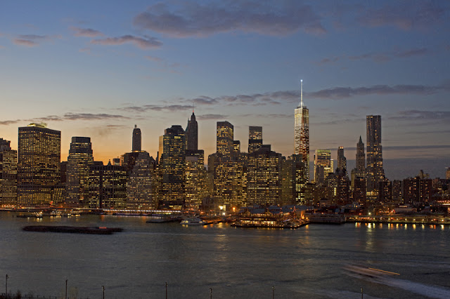 Photo of new towers and Lover Manhattan skyline as seen from across the river