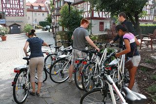 Students use DFSR bikes to explore the town.