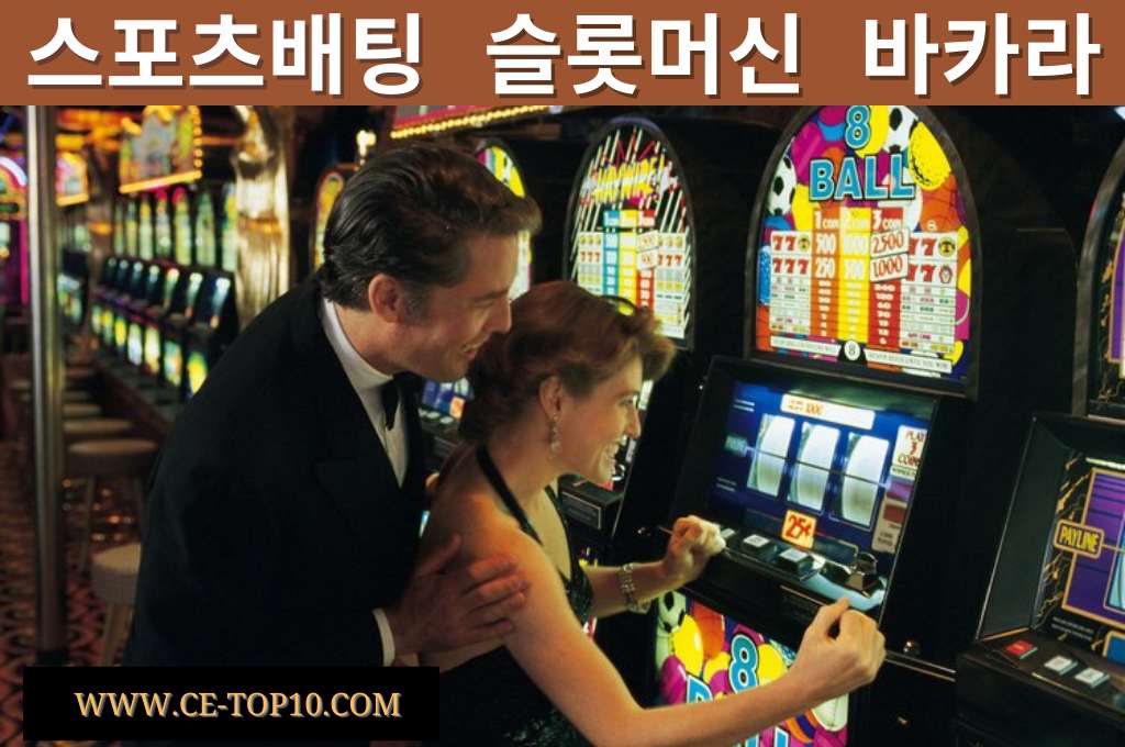 Rich couple enjoy playing gambling machine.