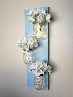 Floreros para decorar el hogar hechos con frascos de vidrio reutilizados
