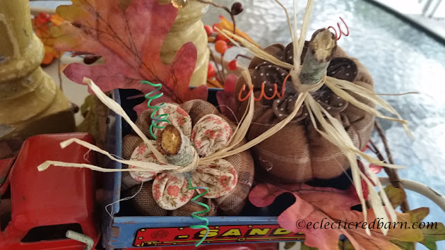 Pumpkins, Spindles, and Vintage Truck Share NOW. #falldecor. #fallvignette #pumpkins #vinatge #eclecticredbarn
