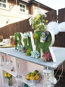 DIY tutorial for an outdoor bar using wooden crates, plus artificial grass bar letters to decorate. Perfect for summer BBQ's or garden parties. 