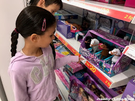 Children browsing Asda toy selection