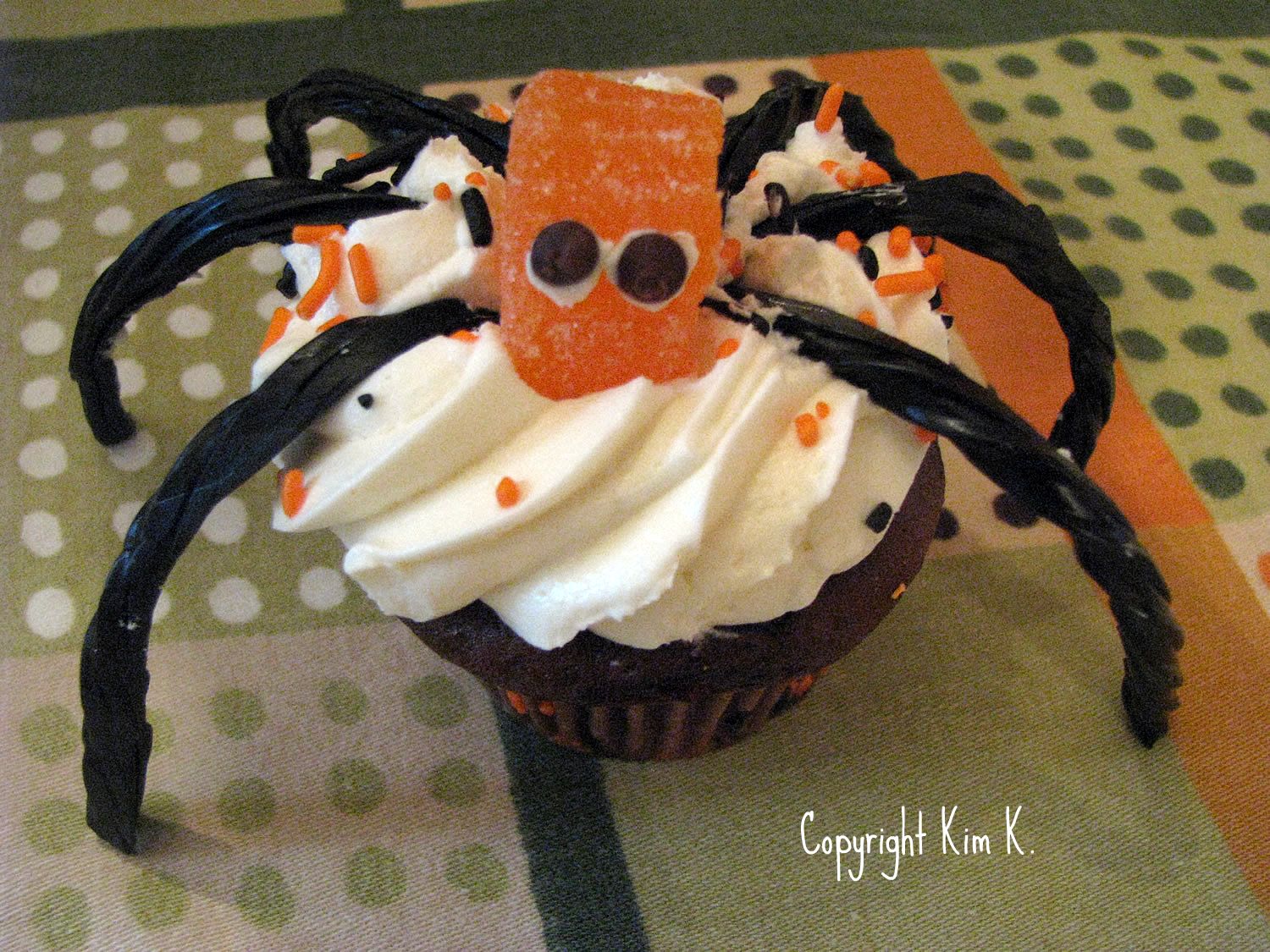 halloween witch cupcakes Iced cupcakes, black licorice, gummy drops, and mini chocolate chips.