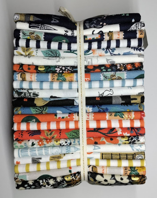 Rifle Paper Co. Suitcases travel-themed quilt