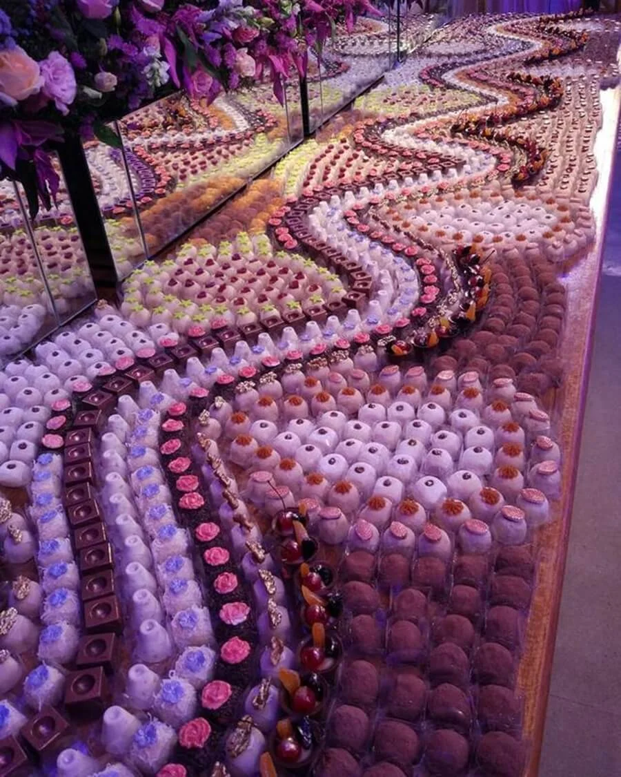 Mesa mosaico de doces para casamento