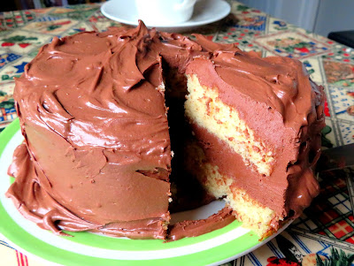 Golden Cake with Chocolate Frosting