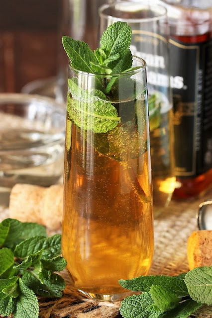 Sparkling Mint Julep Topped with Mint Sprigs Image