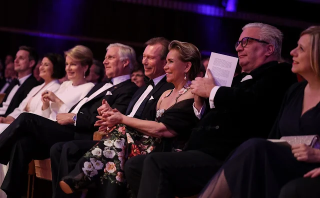 Maria Teresa wore a floral-embroidery dress by Oscar de la Renta, Mathilde wore a Dalista embellished gown by Dries van Noten