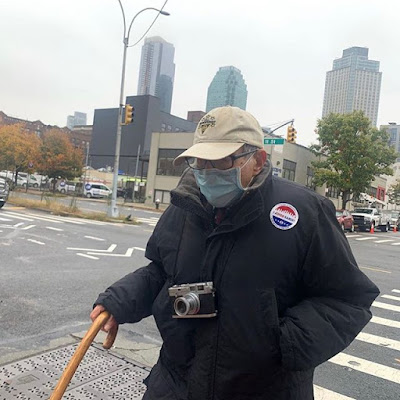 photo of Tony Vacaro walking in Long Island City to vote