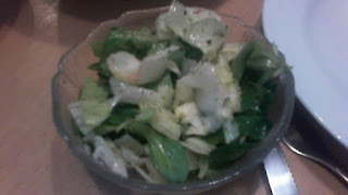 Green mixed salad in a dish