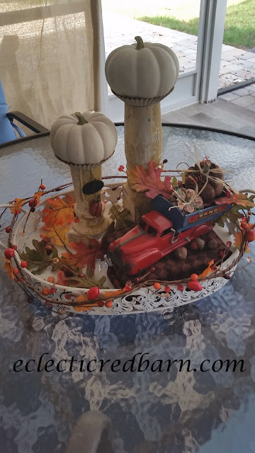 Pumpkins, Spindles, and Vintage Truck Share NOW. #falldecor. #fallvignette #pumpkins #vinatge #eclecticredbarn