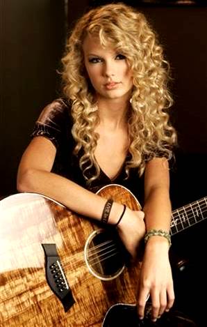 Foto de Taylor Swift con su guitarra