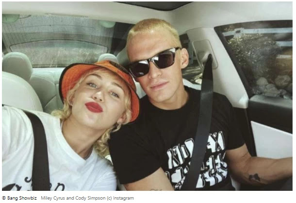 Cody Simpson is "in love" with his "best friend" Miley Cyrus.