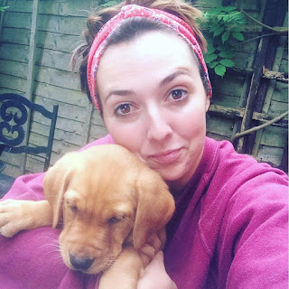 Georgina Bishopp with a puppy