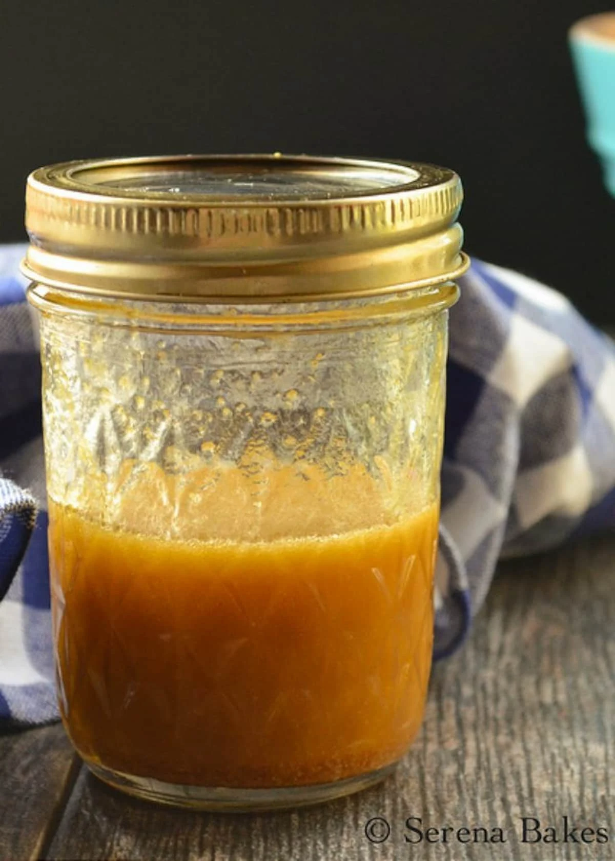 Asian Sesame Dressing in a shaker jar for Broccoli Salad.