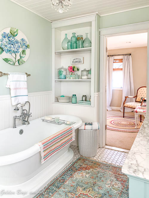 Master Bathroom with pedestal tub and Sherwin William Sea Salt paint - www.goldenboysandme.com