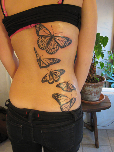 Tattoos On Rib Cage For Girls