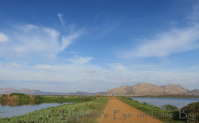 False Bay Ecology Park Landfill ahead, waste water treatment works behind False Bay to the far left