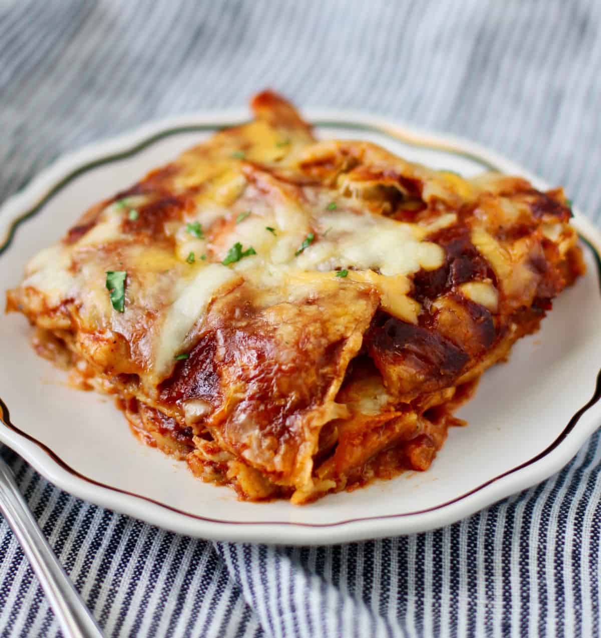 Easy Chicken Enchilada Casserole serving on a plate.