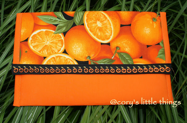 “The Enchanting Orangery” clutch