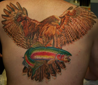 Red Tailed Hawk large tattoo on back body 