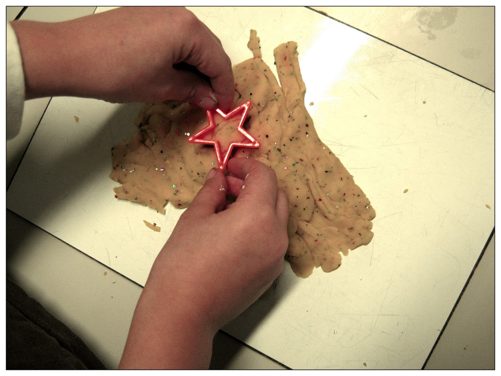 We cut stars from sparkly playdough.