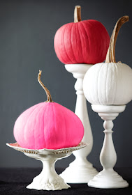pink and white pumpkins on white pedestals, fall decor