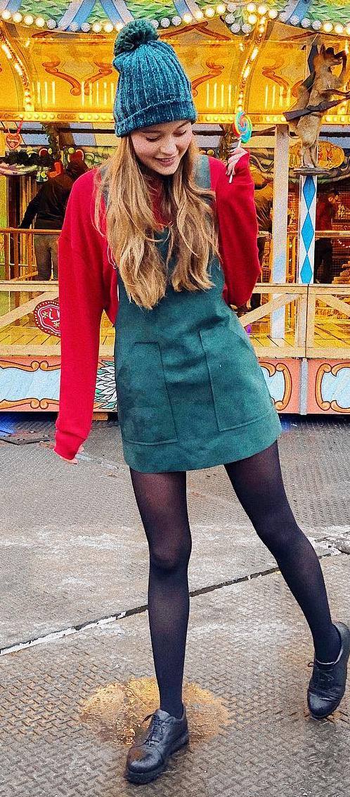 what to wear with a knit hat : red sweatshirt + green dress + boots