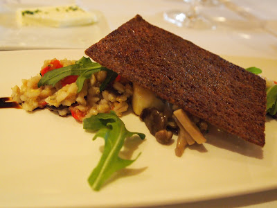 cannellini bean mashed and shaped into a rectangle topped with molasses toast