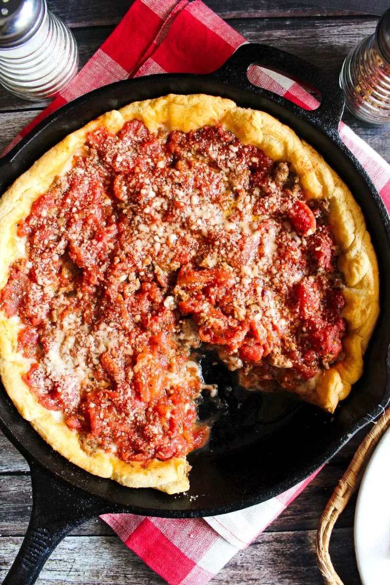 This Crescent Roll Deep Dish Pizza is a fun twist on a classic Chicago-style pie. The crescent rolls make a delicious and easy shortcut crust for this tasty deep dish pizza! #pizza #crescentrolls