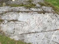 Rock carvings near Björksta church.