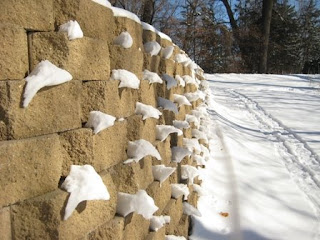 snow melting off bricks