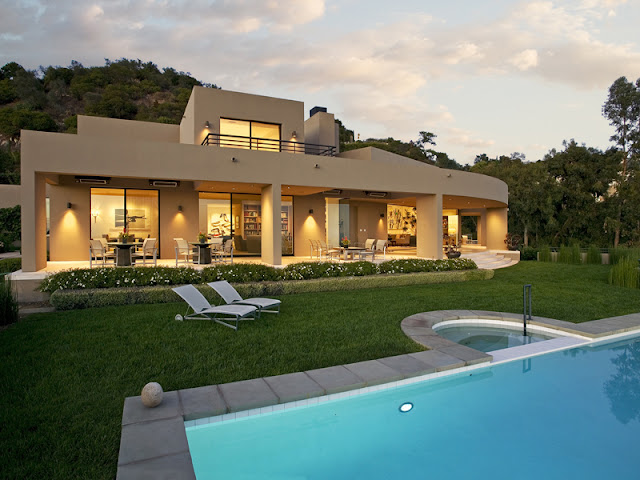 Photo of amazing home as seen from the pool area