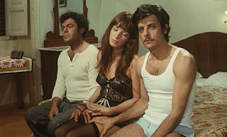 Monica Vitti with Mastroianni (left) and Giancarlo Giannini in Scola's Dramma della gelosia